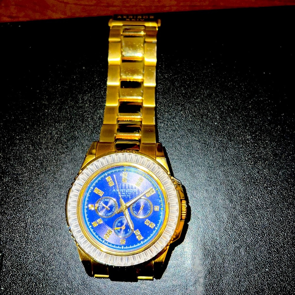 10K Gold Plated Akribos XXIV Crystal Bezel watch w/Diamonds on navy blue Face